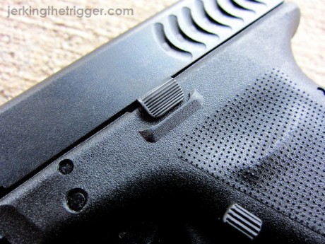 Pictured: Tango Down Vickers Tactical Glock Slide Stop for 9mm/.40SW Glocks.