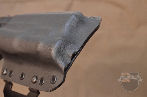 This image shows the 90/10 mold. The majority of the gun's width is molded into the holster's front panel. It also shows the fit and finish issue mentioned earlier in the review.